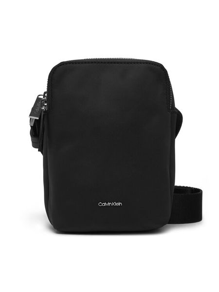 Calvin Klein Saszetka Business Tech Reporter Xs K50K512888 Czarny. Czarne saszetki męskie Calvin Klein, bez wzorów, z materiału. Za 189.99 zł.