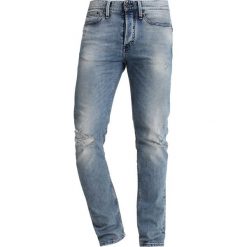 Denham BOLT Jeans Skinny Fit blue denim. Niebieskie jeansy męskie Denham, z bawełny. Za 669.00 zł.