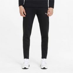 Spodnie męskie Puma EVOSTRIPE. Czarne spodnie dresowe męskie Puma, bez wzorów, z dresówki. Za 281.99 zł.