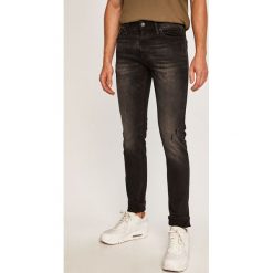 Jack & Jones - Jeansy Glenn. Czarne jeansy męskie Jack & Jones, bez wzorów, z bawełny. W wyprzedaży za 139.90 zł.