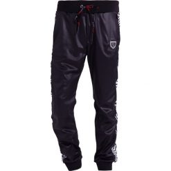 Plein Sport WAY Spodnie treningowe black. Długie spodnie sportowe męskie marki Plein Sport. W wyprzedaży za 999.20 zł.