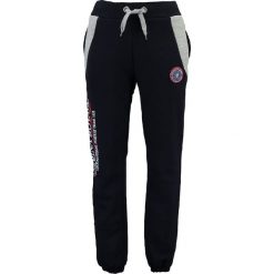 Spodnie dresowe "Mirana" w kolorze granatowym. Niebieskie spodnie dresowe męskie marki Geographical Norway, z aplikacjami, z dresówki. W wyprzedaży za 117.95 zł.