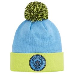 Młodzieżowa czapka beanie z pomponem Manchester City PUMA Magic Blue Yellow Glow. Niebieskia czapki męskie Puma, bez wzorów, młodzieżowe. Za 142.99 zł.