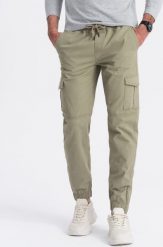 Ombre Spodnie męskie JOGGERY z zapinanymi kieszeniami cargo - khaki V1 OM-PAJO-0123 XXL. Brązowe długie spodnie sportowe męskie Ombre, bez wzorów. Za 159.99 zł.