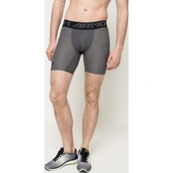 Under Armour - Szorty. Czarne szorty sportowe męskie Under Armour, bez wzorów, z dzianiny, sportowe. W wyprzedaży za 89.90 zł.