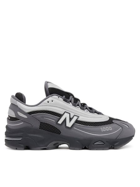 New Balance Sneakersy M1000MEG Szary. Szare buty sportowe na co dzień męskie New Balance, m, bez wzorów, ze skóry, bez ramiączek, bez kaptura. Za 519.99 zł.