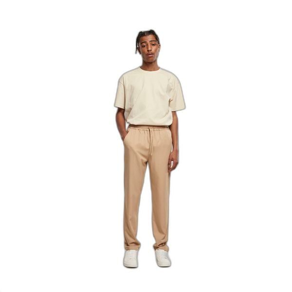 Spodnie do biegania Urban Classics Tapered GT. Brązowe spodnie dresowe męskie Urban Classics, bez wzorów, z dresówki, casualowe, długie. Za 261.50 zł.