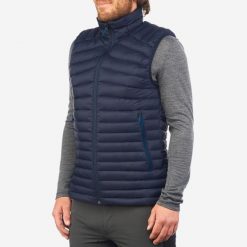 Kamizelka trekkingowa męska puchowa Forclaz MT100. Niebieskie kamizelki męskie FORCLAZ, l, z materiału, bez kaptura. Za 229.99 zł.