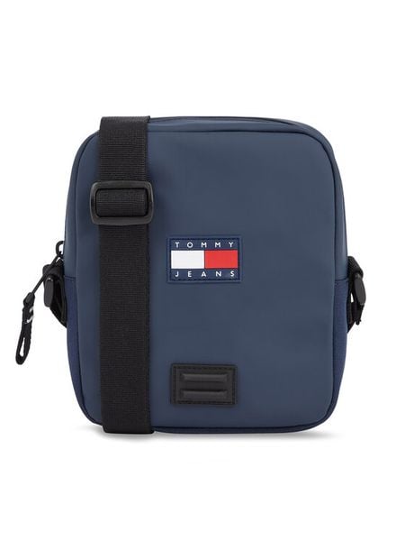 Tommy Jeans Saszetka Tjm To Go Reporter AM0AM11634 Granatowy. Niebieskie saszetki męskie Tommy Jeans, bez wzorów, z jeansu. Za 159.99 zł.