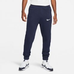 Spodnie treningowe męskie Nike FLC Park20. Białe długie spodnie sportowe męskie Nike, bez wzorów, z bawełny, na fitness i siłownię. Za 239.99 zł.