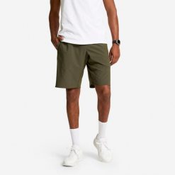 Spodenki fitness cardio męskie Domyos. Brązowe szorty sportowe męskie DOMYOS, bez wzorów, z materiału, sportowe. Za 79.99 zł.