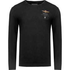 T-shirt AERONAUTICA MILITARE Czarny. Czarne koszulki męskie z długim rękawem Aeronautica Militare, z aplikacjami, z włoskim kołnierzykiem, z długim rękawem. Za 300.00 zł.
