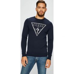 Guess Jeans - Sweter. Czarne swetry męskie Guess Jeans, z aplikacjami, z dzianiny, z okrągłym kołnierzem, z krótkim rękawem. Za 399.90 zł.