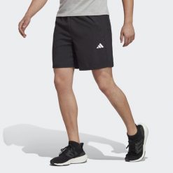 Train Essentials Woven Training Shorts. Białe spodnie dresowe męskie ADIDAS, bez wzorów, z dresówki, casualowe. Za 97.99 zł.