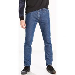 Dżinsy "L8" - Slim fit - w kolorze niebieskim. Niebieskie jeansy męskie Denim Special, z aplikacjami, z bawełny, klasyczne. W wyprzedaży za 189.95 zł.