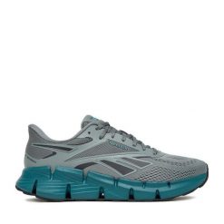Buty do biegania Reebok. Brązowe buty do biegania męskie Reebok, bez wzorów, bez zapięcia, do biegania. Za 259.99 zł.