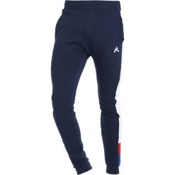 Le coq sportif INSPI FOOTBALL Spodnie treningowe dress blues. Długie spodnie sportowe męskie marki le coq sportif. Za 379.00 zł.