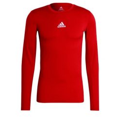 Koszulka męska adidas Compression Long Sleeve Tee. Czerwone bielizna termoaktywna męska ADIDAS, m, bez wzorów, bez ramiączek, do piłki nożnej. Za 79.09 zł.