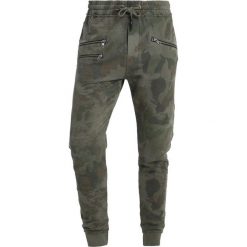 Tigha BEEK Spodnie treningowe natural. Długie spodnie sportowe męskie Tigha. Za 379.00 zł.