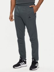 Adidas Spodnie dresowe Pump Workout IT4311 Zielony Regular Fit. Zielone długie spodnie sportowe męskie ADIDAS, bez wzorów, z bawełny, na fitness i siłownię. Za 229.99 zł.