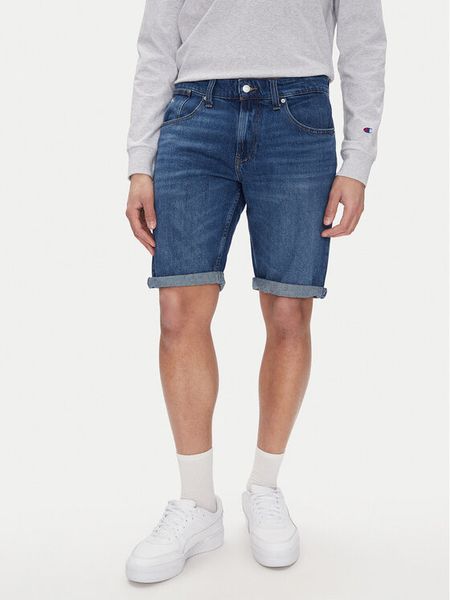 Tommy Jeans Szorty jeansowe Ronnie DM0DM20943 Granatowy Regular Fit. Niebieskie szorty męskie Tommy Jeans, bez wzorów, z bawełny. Za 199.99 zł.