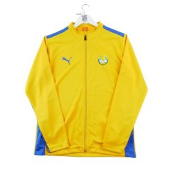 Second life - Męska pomarańczowa kurtka do dresu - Jak nowy. Brązowe kurtki męskie Puma, m, bez wzorów, z dresówki, sportowe, bez ramiączek, bez kaptura. Za 105.71 zł.