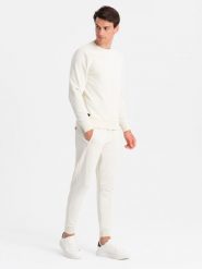 Bawełniany dresowy komplet męski BASIC bluza nierozpinana + joggery – kremowy V5 - Rozmiar: L. Białe bluzy nierozpinane męskie Ombre Clothing, l, bez wzorów, z bawełny, bez ramiączek, bez kaptura. W wyprzedaży za 202.49 zł.