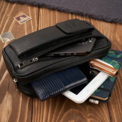 Paolo Peruzzi Saszetka męska skórzana do ręki z miejscem na telefon czarna T-132-BL. Czarne saszetki męskie Paolo Peruzzi, bez wzorów. Za 178.31 zł.