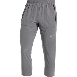 Nike Performance RUNNING PANTS RUN DIVISION Spodnie treningowe black. Czarne spodnie dresowe męskie Nike Performance, z elastanu, długie. Za 399.00 zł.