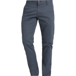 DOCKERS ALPHA ORIGINAL Spodnie materiałowe ombre blue. Spodnie na co dzień męskie marki DOCKERS. Za 379.00 zł.