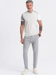 Ombre Męskie spodnie dresowe typu jogger - szare V8 OM-PABS-0173 XXL. Szare długie spodnie sportowe męskie Ombre, bez wzorów, z dresówki. Za 89.99 zł.