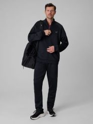 4F Spodnie treningowe szybkoschnące męskie - czarne XXL. Czarne długie spodnie sportowe męskie 4f, bez wzorów, ze skóry, na fitness i siłownię. Za 179.99 zł.