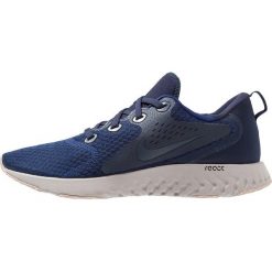 Nike Performance LEGEND REACT Obuwie do biegania treningowe blue void/thunder blue/obsidian/diffused taupe/moon particle. Buty treningowe męskie marki Nike Performance. Za 419.00 zł.