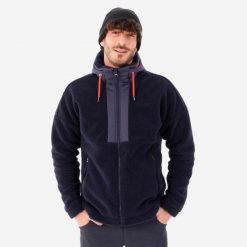 Polar turystyczny męski Quechua Sherpa SH900 Warm. Niebieskie bluzy z polaru męskie QUECHUA, m, bez wzorów, z polaru, sportowe, bez ramiączek, bez kaptura. Za 249.99 zł.