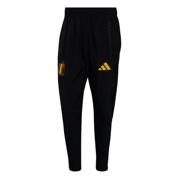 Spodnie Belgium Tiro Tech. Czarne spodnie dresowe męskie ADIDAS, bez wzorów, z dresówki. Za 329.00 zł.