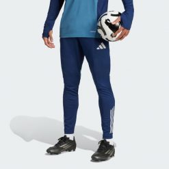 Spodnie Arsenal Tiro 25 Competition Training. Niebieskie spodnie dresowe męskie ADIDAS, bez wzorów, z dresówki. Za 279.00 zł.