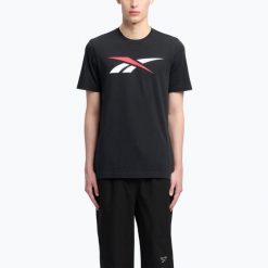 Koszulka Under Armour Tech Polo. Czarne koszulki polo męskie REEBOK FITNESS, bez wzorów, sportowe, bez kołnierzyka, bez ramiączek. Za 69.99 zł.