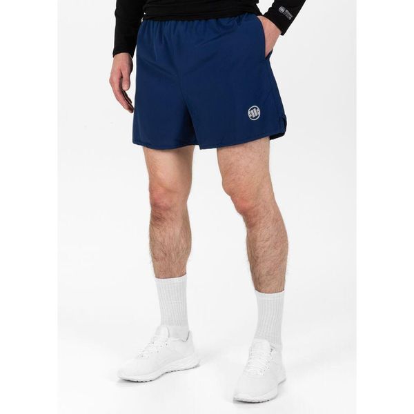 Spodenki treningowe męskie Pitbull West Coast Performance Small Logo. Niebieskie szorty sportowe męskie PITBULL, bez wzorów, sportowe. Za 139.00 zł.