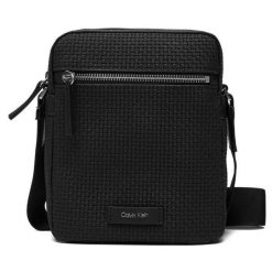 Saszetka Calvin Klein. Czarne saszetki męskie Calvin Klein, bez wzorów, małe. Za 369.99 zł.