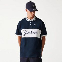 Polo New York Yankees Graphic. Niebieskie koszulki polo męskie New Era, m, bez wzorów, sportowe, bez kołnierzyka, bez ramiączek. Za 266.50 zł.