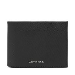 Portfel Calvin Klein. Czarne portfele męskie Calvin Klein, bez wzorów. Za 279.99 zł.