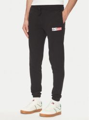 Tommy Jeans Spodnie dresowe Entry DM0DM20277 Czarny Slim Fit. Czarne spodnie dresowe męskie Tommy Jeans, bez wzorów, z bawełny. Za 179.99 zł.