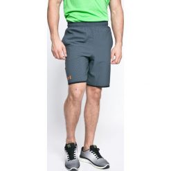 Under Armour - Szorty. Szare szorty sportowe męskie Under Armour, z dzianiny, sportowe. W wyprzedaży za 129.90 zł.