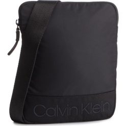 Saszetka CALVIN KLEIN - Shadow Flat Crossover K50K504393 001. Saszetki męskie Calvin Klein. W wyprzedaży za 249.00 zł.