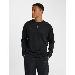 Koszulka z długim rękawem Hummel Pulse Performance. Czarne koszulki męskie z długim rękawem HUMMEL, bez wzorów, sportowe, bez kołnierzyka, bez ramiączek. Za 175.00 zł.