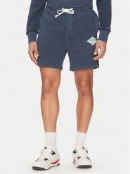 Tommy Jeans Szorty sportowe Varsity DM0DM20936 Granatowy Regular Fit. Niebieskie szorty sportowe męskie Tommy Jeans, bez wzorów, z bawełny, sportowe. Za 189.99 zł.