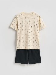 Dwuczęściowa piżama ze wzorem - kremowy. Białe piżamy męskie Reserved, l, bez wzorów, z bawełny, bez kołnierzyka, bez ramiączek. Za 89.99 zł.