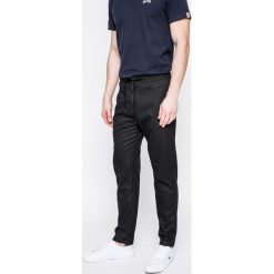 Guess Jeans - Spodnie. Spodnie na co dzień męskie marki Guess Jeans. W wyprzedaży za 199.90 zł.