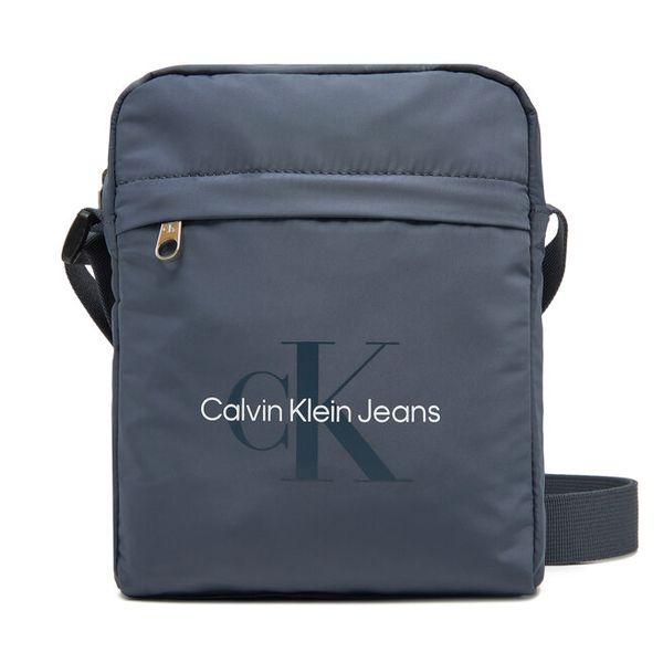 Saszetka Calvin Klein Jeans. Niebieskie saszetki męskie Calvin Klein Jeans, bez wzorów, z jeansu, małe. Za 159.99 zł.
