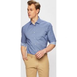 Tommy Hilfiger Tailored - Koszula. Niebieskie koszule męskie Tommy Hilfiger Tailored, bez wzorów, z bawełny, bez kołnierzyka, bez ramiączek. W wyprzedaży za 219.90 zł.